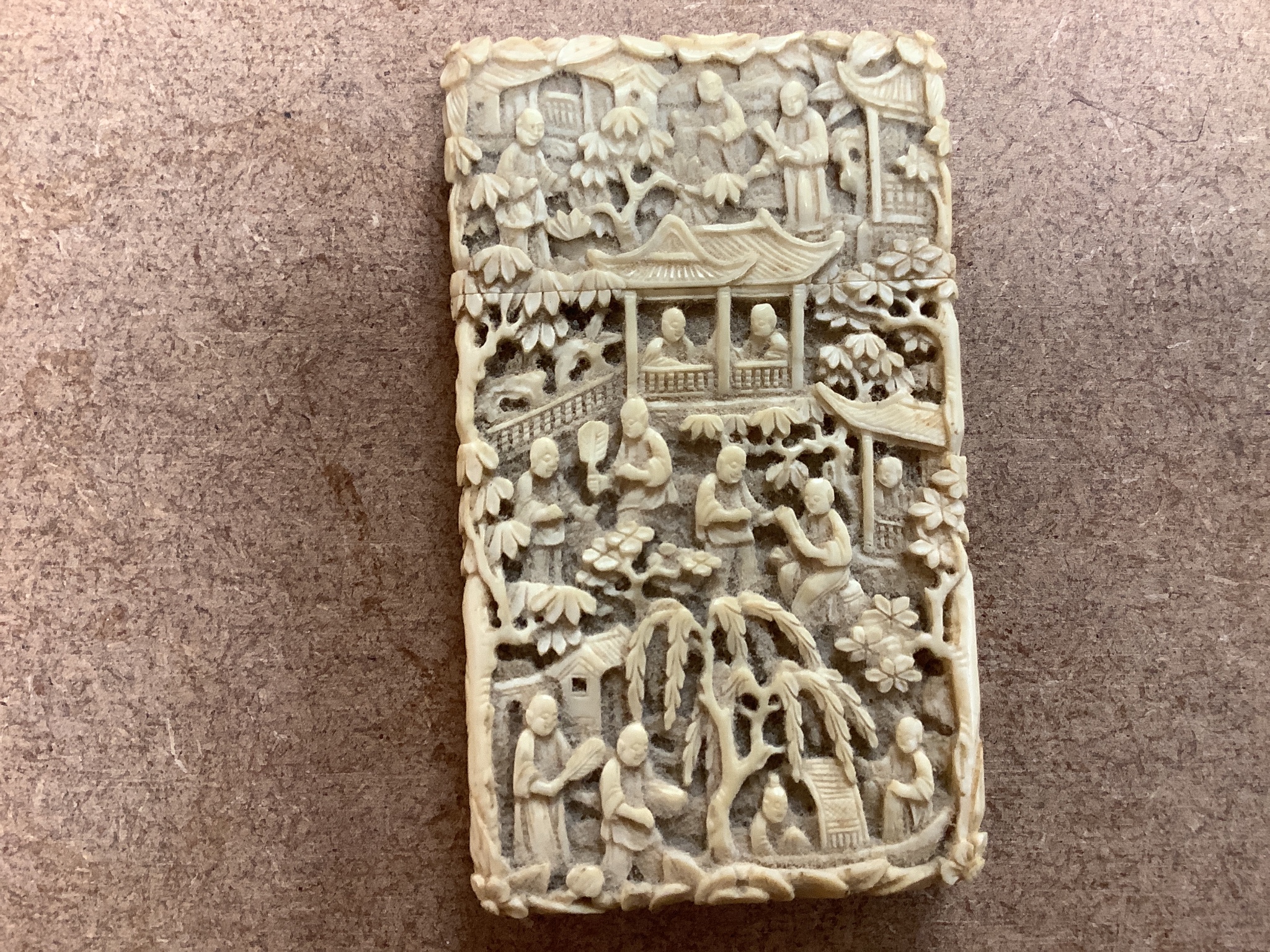 A Chinese Cantonese carved ivory card case, 9.5cm